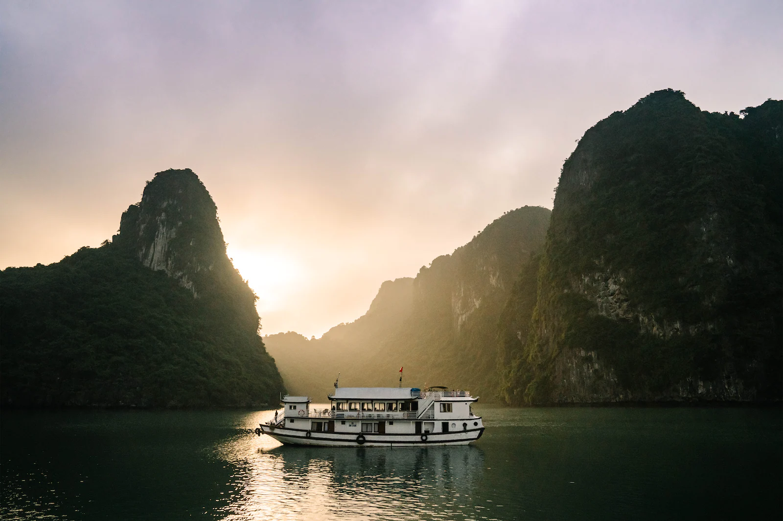 Resting boat inbetween Ha Long Bay islands