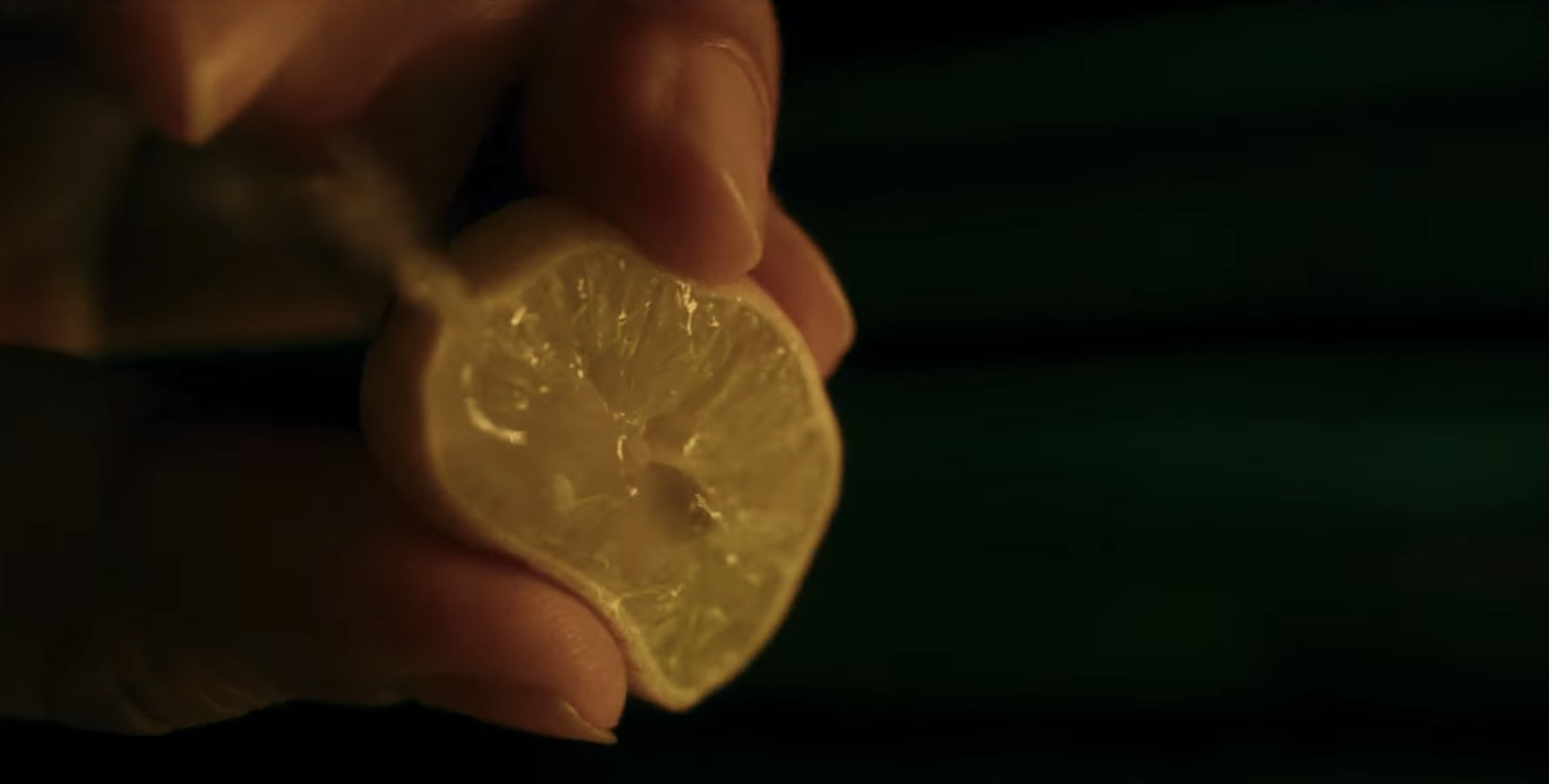 Scene from the Video: Squeezing lemon